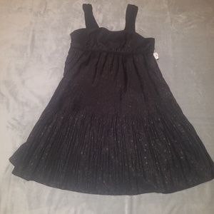 Black babydoll mini dress.